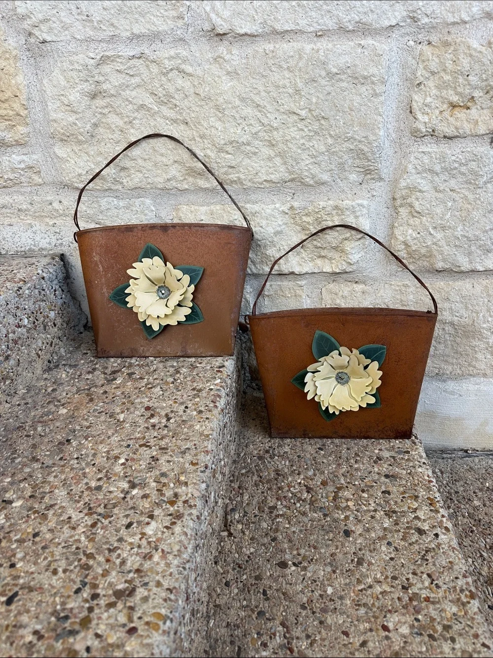 Rust Metal Hanging Planters with Cream Flower Accent